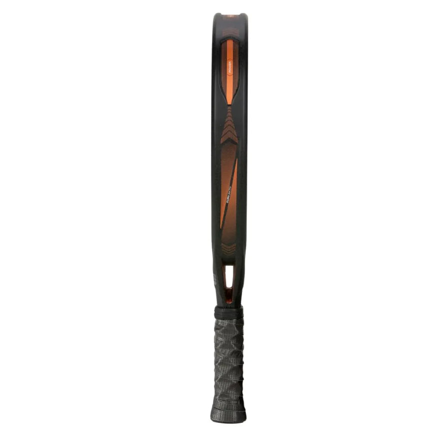The BULLPADEL RACKET VERTEX 04 2025 JUAN TELLO by Padel Smash Academy features a side view with an orange inner and black outer frame, wrapped in dark grip tape. Its modern, sleek design enhances control and athletic functionality.