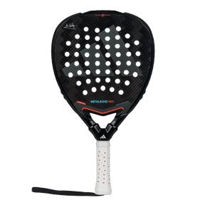 The Adidas Metalbone HRD+ 3.4 Ale Galan 2025 padel racket features a perforated black surface with red accents. Tailored for offensive play, its handle includes a white grip with red dots, allowing match customization.