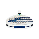 The Bullpadel Racket Pearl 2024 Bea González is displayed on a white background, featuring a perforated face in white and blue. The handle has a TRINAMIC technology grip in white. A pearl heart logo and text enhance its sleek design.