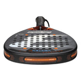 Close-up of the BULLPADEL RACKET VERTEX 04 2025 JUAN TELLO by Padel Smash Academy, like new. It features a black and orange design with a perforated face and wrist strap for total control. Dynamic patterns and branding complete its sleek look.