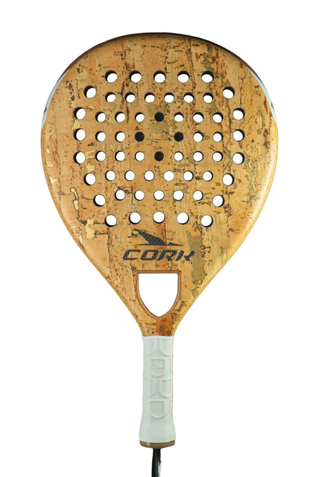 Close-up of the Cork Padel Classic by Cork Padel. The racket showcases a wooden texture, circular holes in an innovative pattern, white edges, and a grip handle for optimal comfort and control, with Cork displayed on its surface.