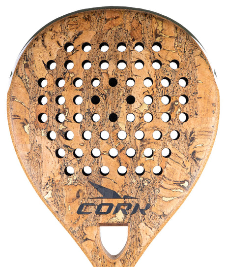 The Cork Padel Supreme Control III, designed for advanced players, features a cork teardrop shape with patterned circular holes. The handle is prominently at the bottom, and a stylized logo adorns the center, making it perfect for defensive play.