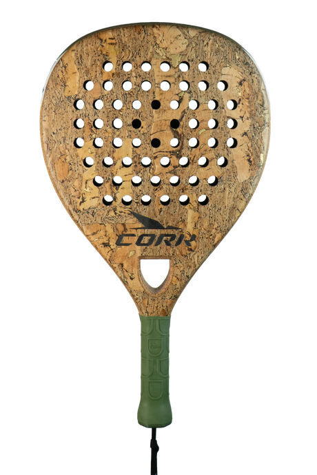 Introducing the Cork Padel Supreme Power III Racket: a cork-patterned padel racket with a light brown, textured surface and black grip. Crafted for offensive players with high carbon composition, it features multiple circular holes and a centered black logo. The handle includes a wrist strap.