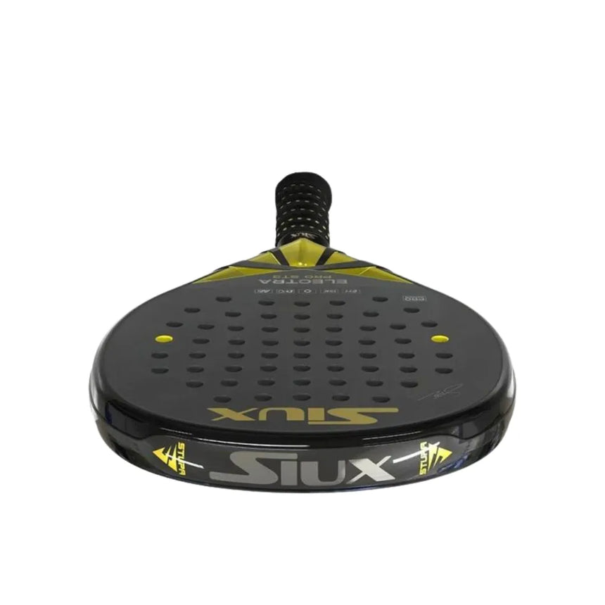 Front view of the sleek black Siux Padel Racket Electra Pro ST3 2024 Franco Stupa with striking yellow accents, endorsed by Franco Stupaczuk; features a grid of small holes, a textured black grip, and bold Siux branding in yellow and gray.