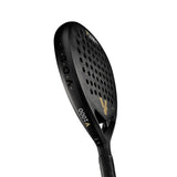 The black VOLT 1000 V23 padel racket from Volt features a perforated surface and diamond-shaped blade for aggressive play. Its sleek, modern design is enhanced with gold and white lettering for top court performance.