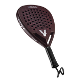 The VOLT 950 V23 padel racket by Volt, designed for advanced players, features a maroon perforated face for optimal power and control. It includes a black grip with the V950 model name and branded logo near the top, along with a securely attached wrist strap for convenience.