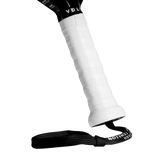 A close-up of the Volt VOLT BOOSTER pickleball paddle handle wrapped in white grip tape with a power boost touch. A black wrist strap, like a supercharger smash cap, is attached at the base, set against a sleek black background.
